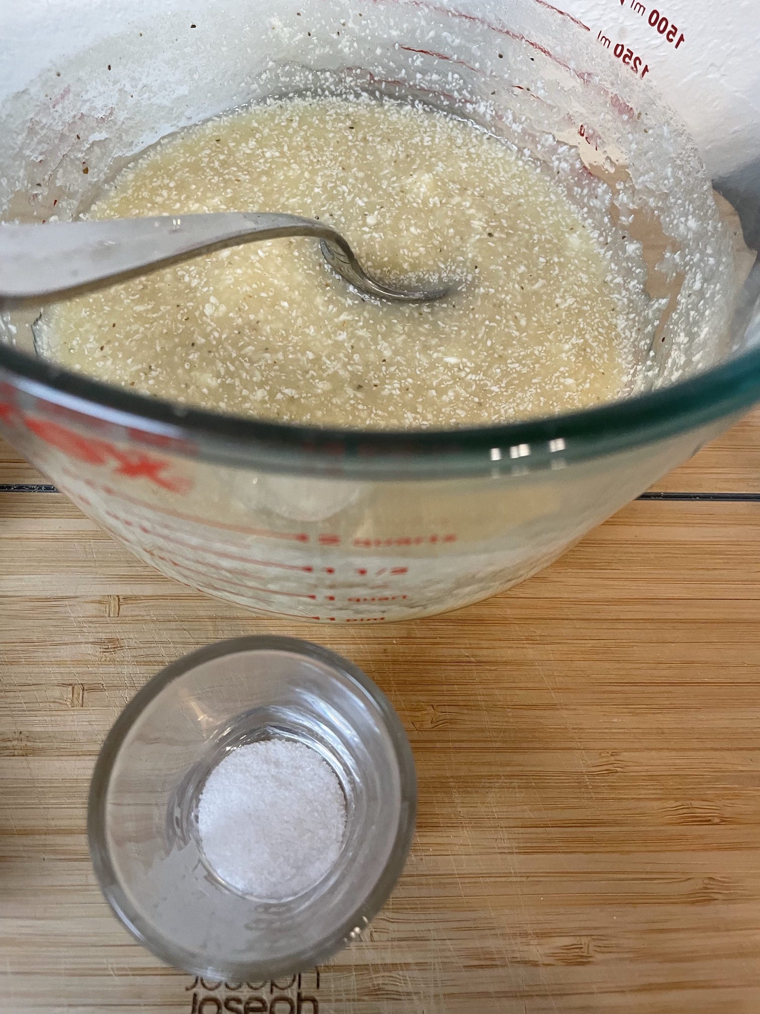 Blended pears, yeast, and the optional butter in a clear container.