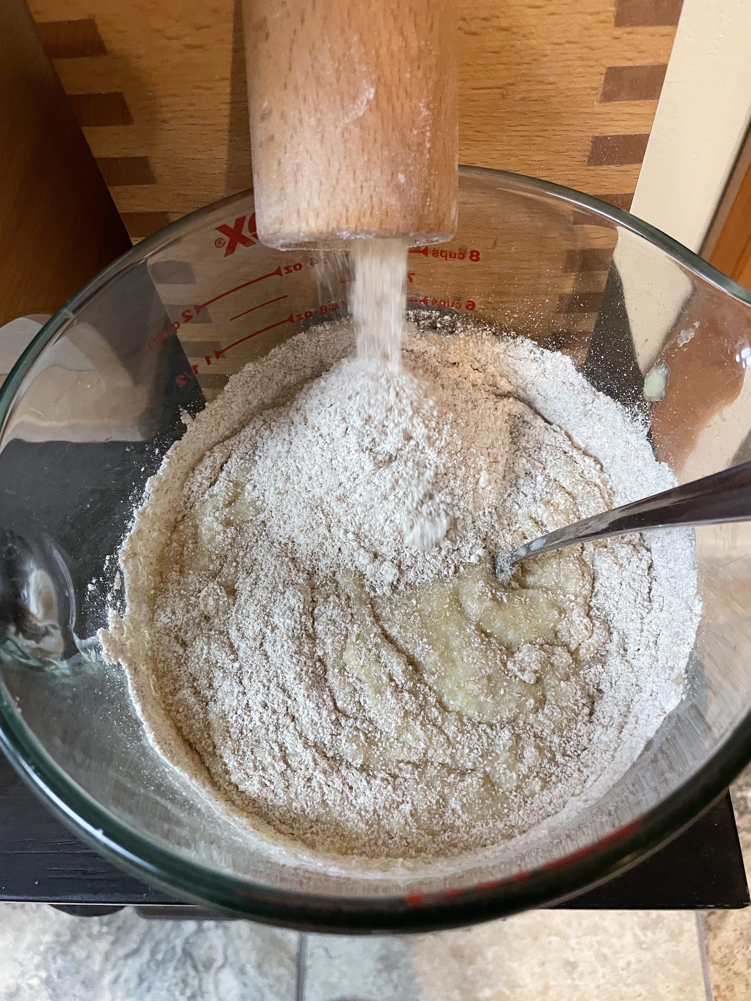 Milling flour directly into liquid for bread dough.
