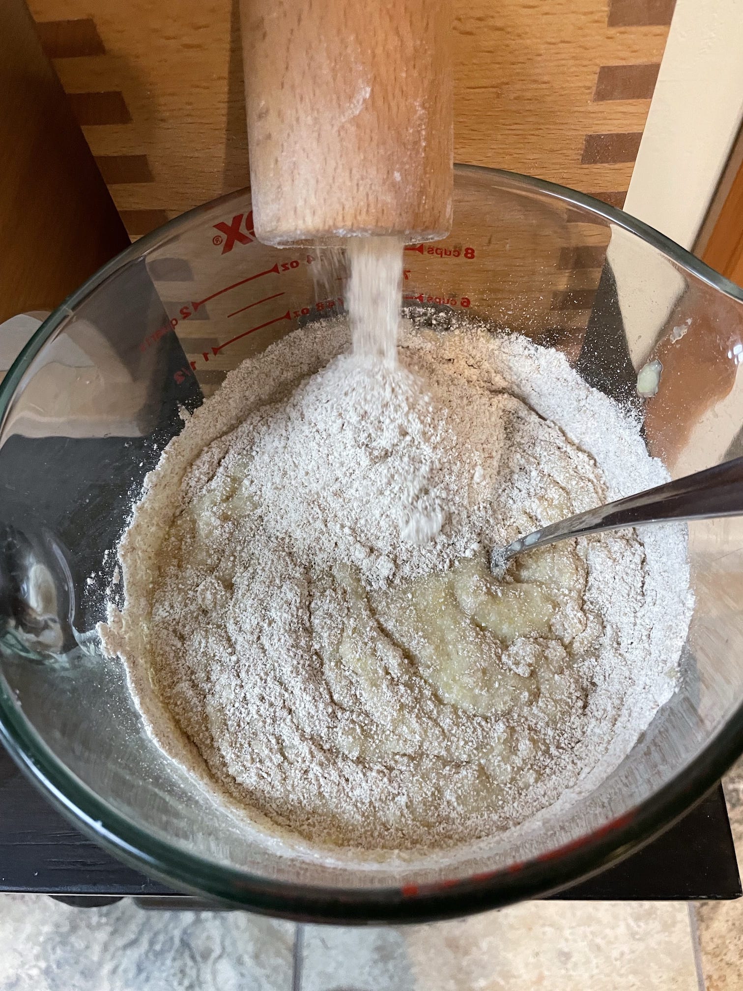 Milling flour directly into liquid for bread dough. Milling flour directly into liquid for bread dough.